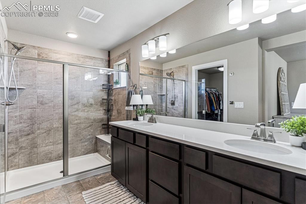 Image 23 of 31: Primary Suite, Quartz countertops, Walk in Closet