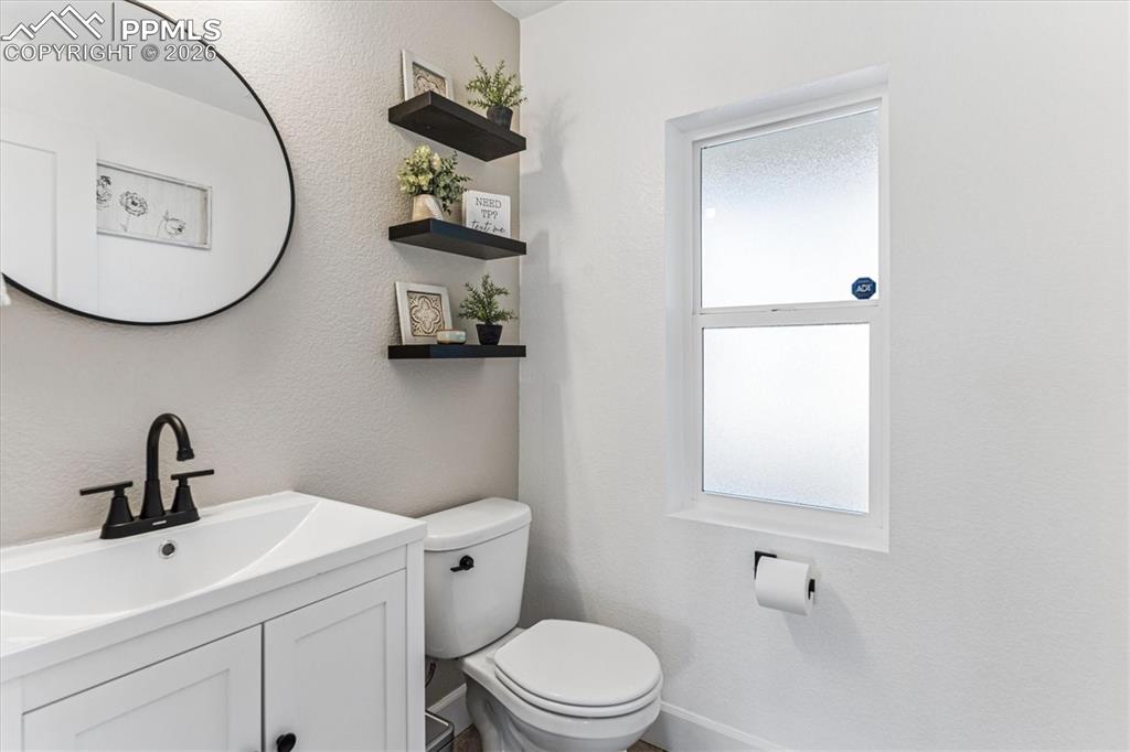 Image 24 of 31: Main level Powder Bath