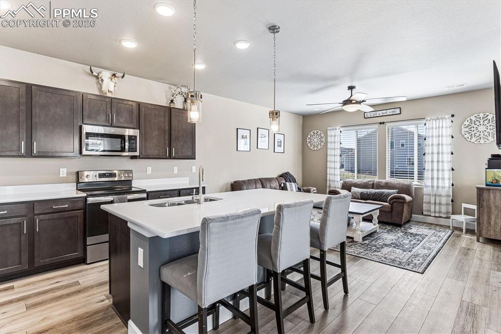 Image 8 of 31: Open to Living room