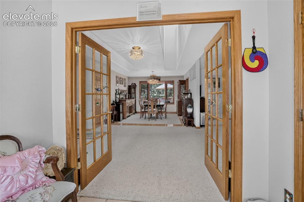 Image 13 of 49: Front entrance foyer with mud room area.