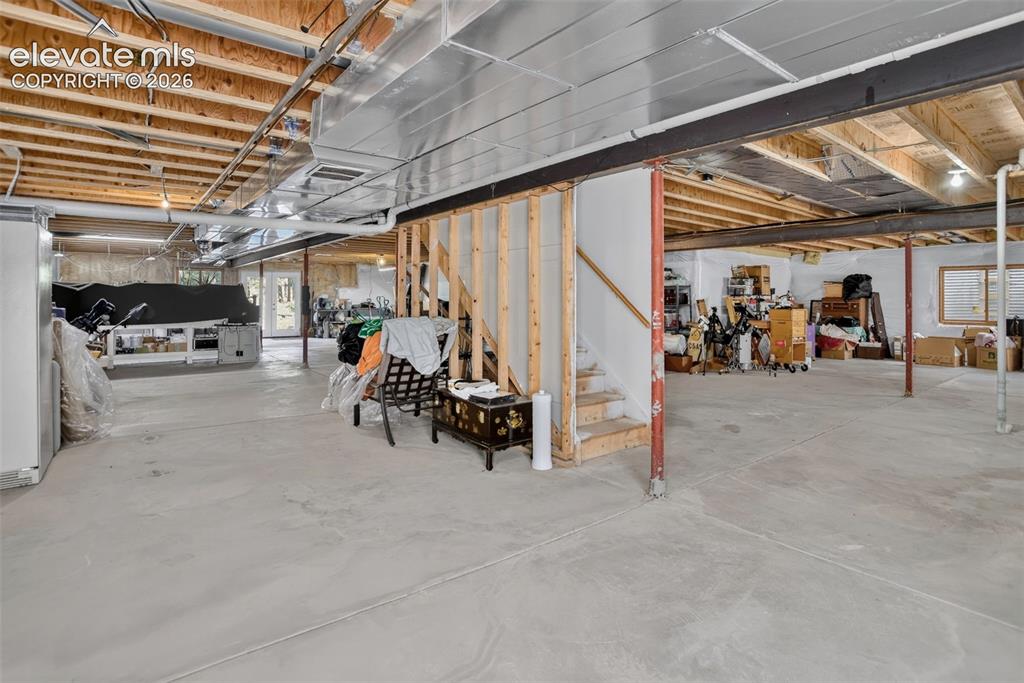 Image 35 of 49: Unfinished basement. 