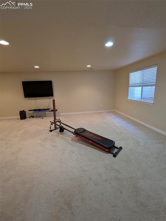 Image 24 of 33: Workout room featuring carpet floors and recessed lighting