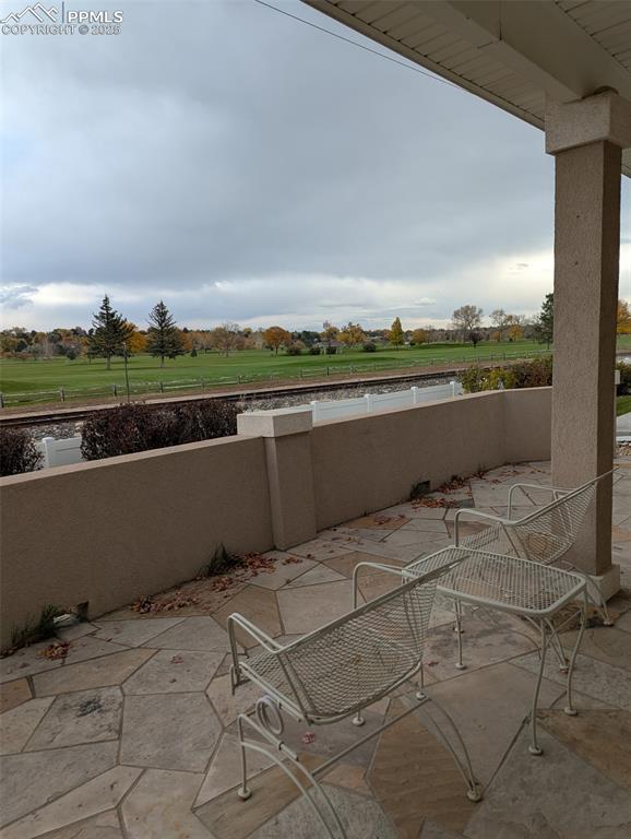 Image 33 of 33: Fenced backyard featuring a patio area