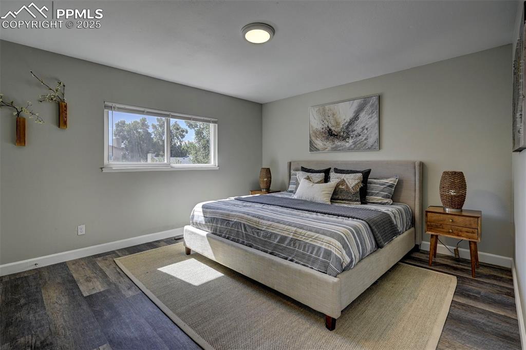 Image 14 of 49: Walk-in Closet, newer flooring throughout