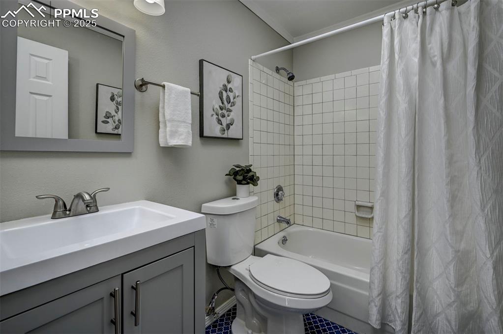 Image 16 of 49: Updated Bathroom w/ Tub