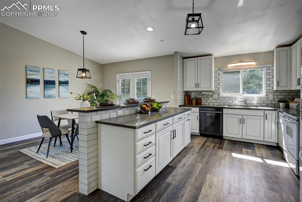 Image 3 of 49: Kitchen Island and Breakfast Bar