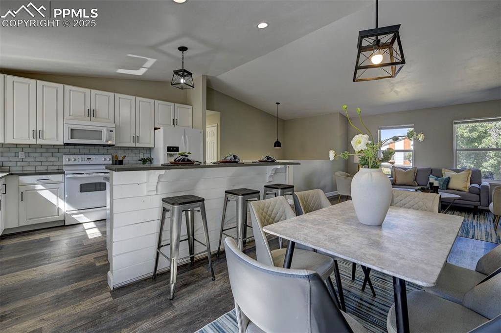 Image 6 of 49: Breakfast Bar and Formal Dining