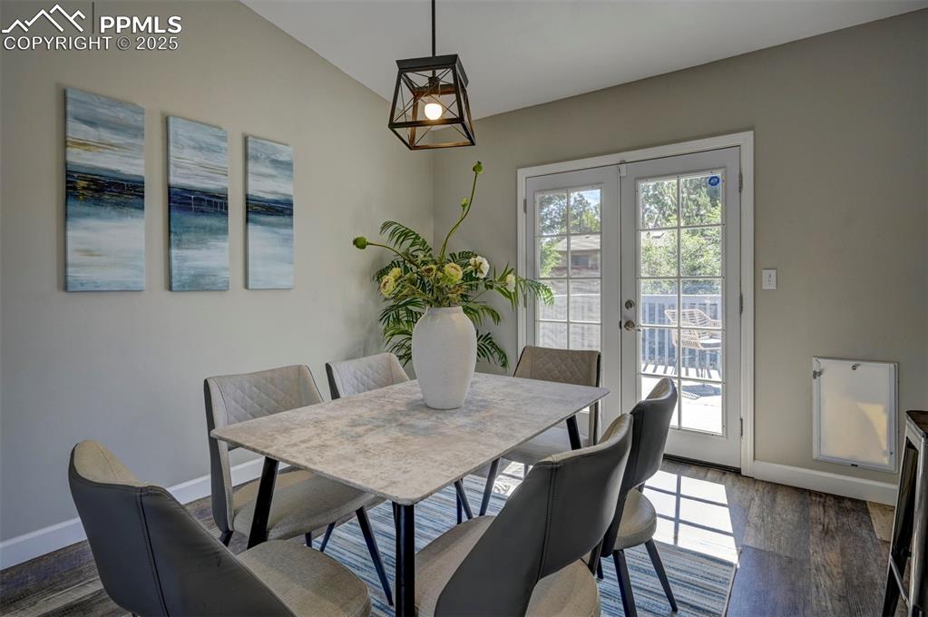 Image 7 of 49: French Doors to the Deck from Dining