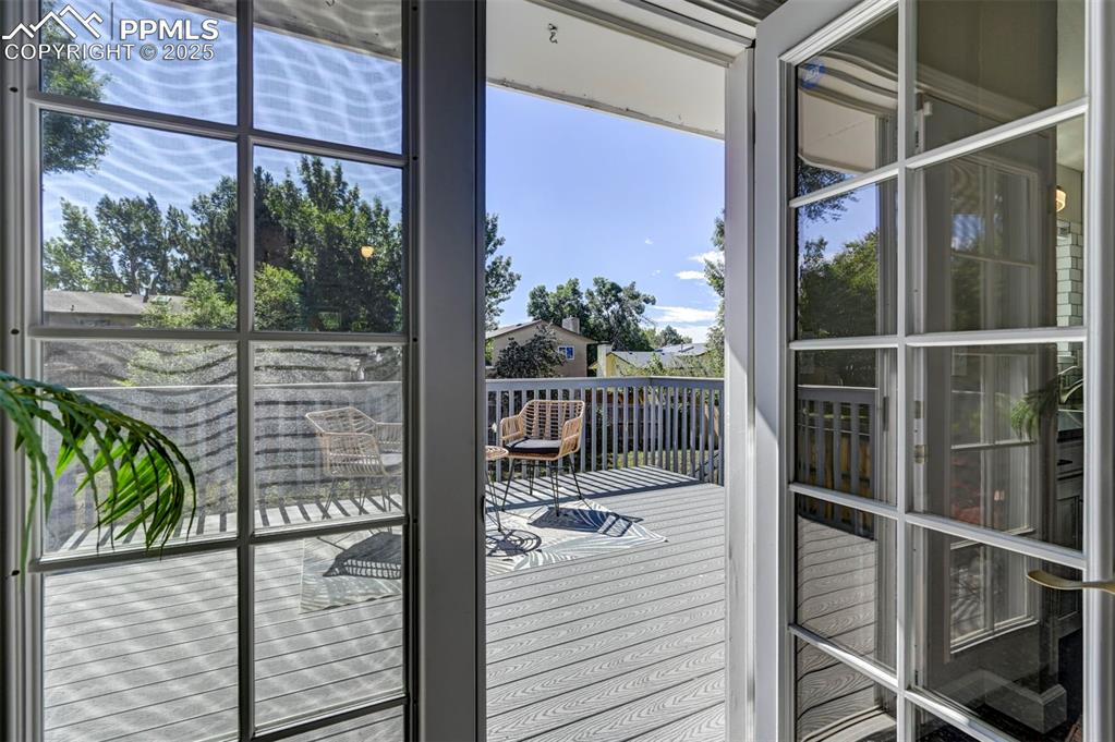 Image 8 of 49: French Doors to the Deck from Dining