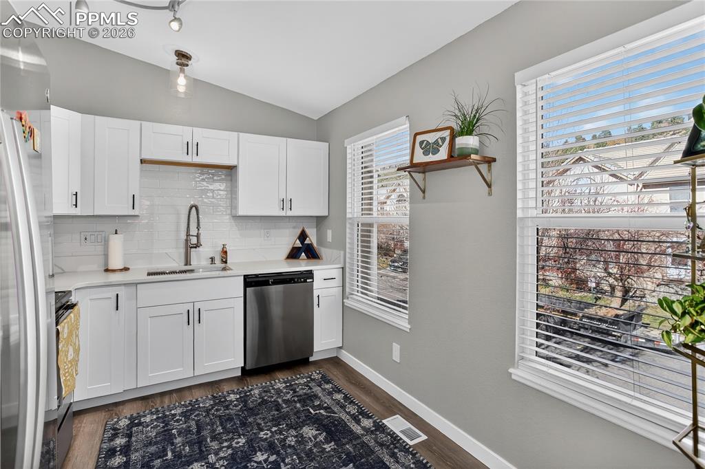 Image 5 of 14: Kitchen with contemporary finishes
