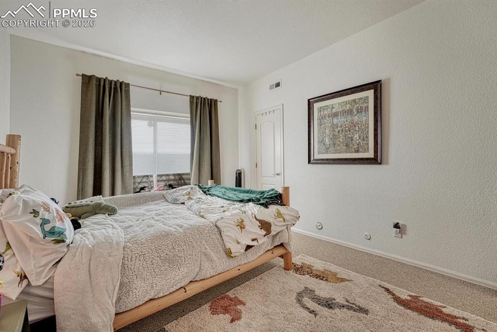 Image 36 of 48: Bedroom