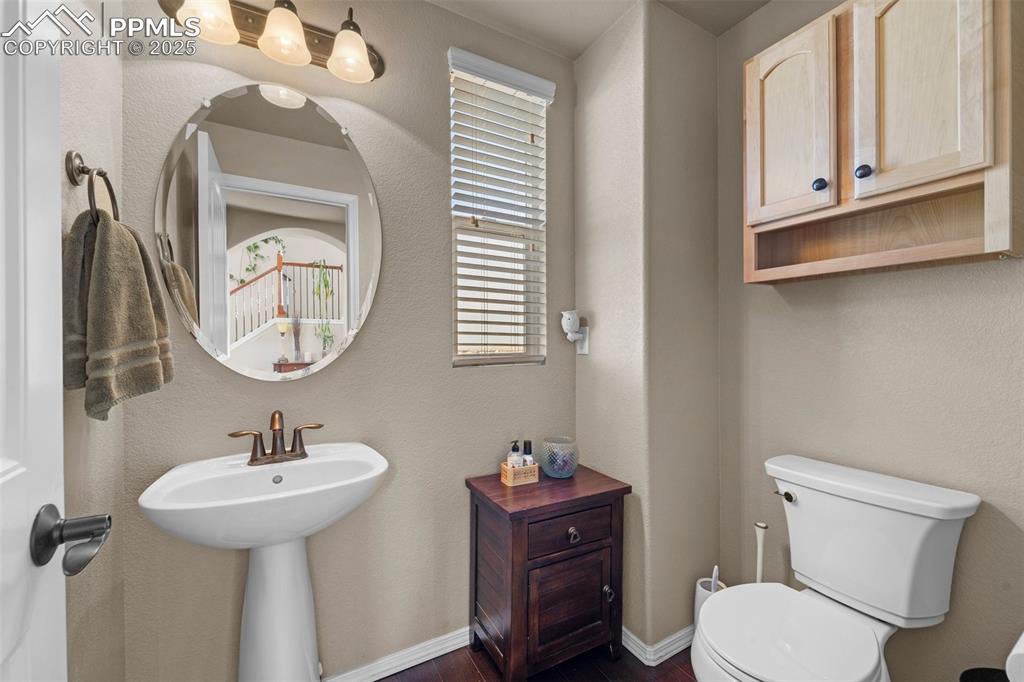 Image 16 of 50: Bathroom featuring sink and toilet
