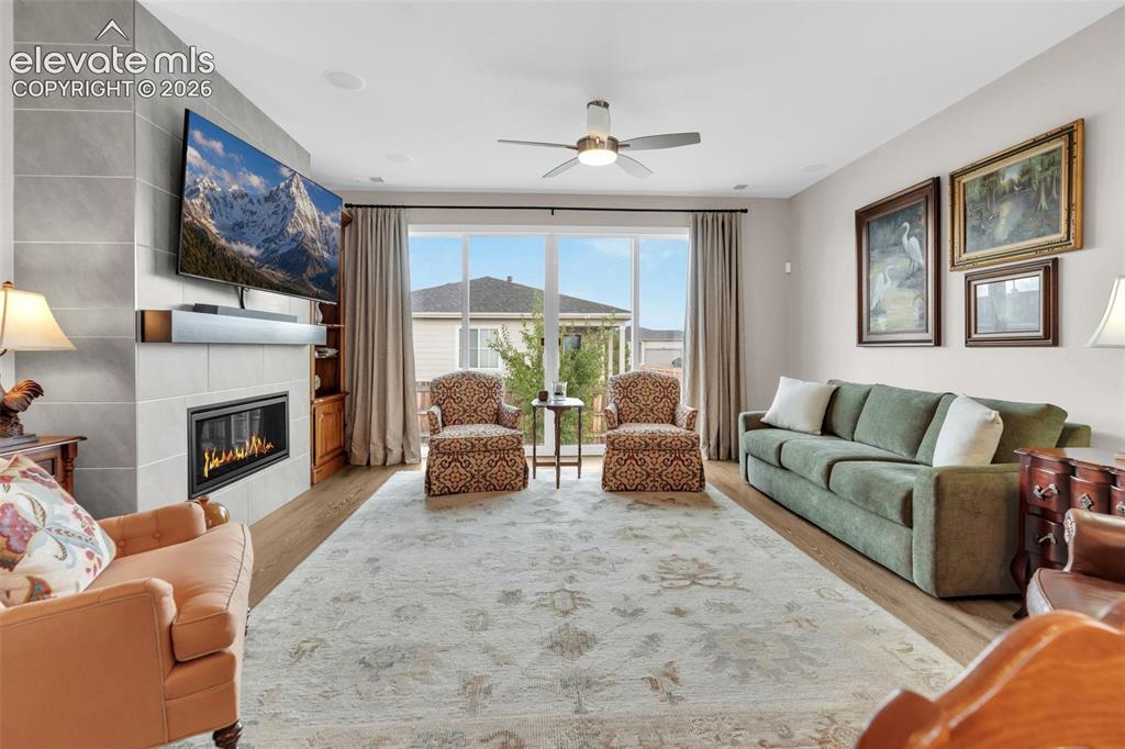 Image 10 of 36: Living Room with Gas Fireplace