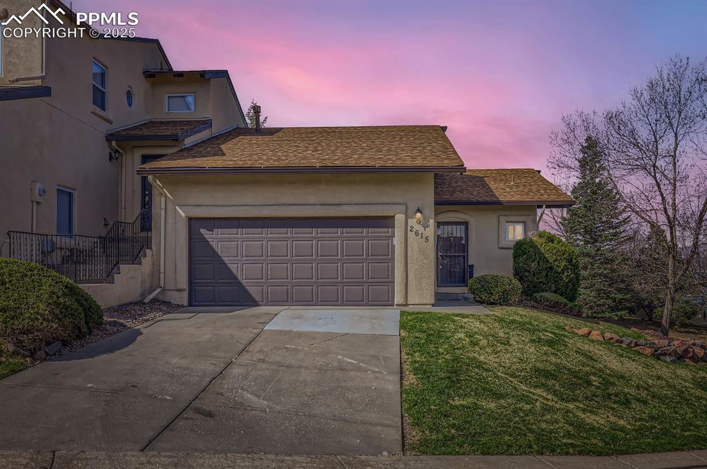 Image 27 of 27: Sunset view of front of property