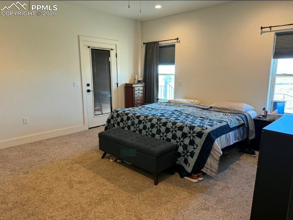 Image 16 of 40: Exterior door to back patio