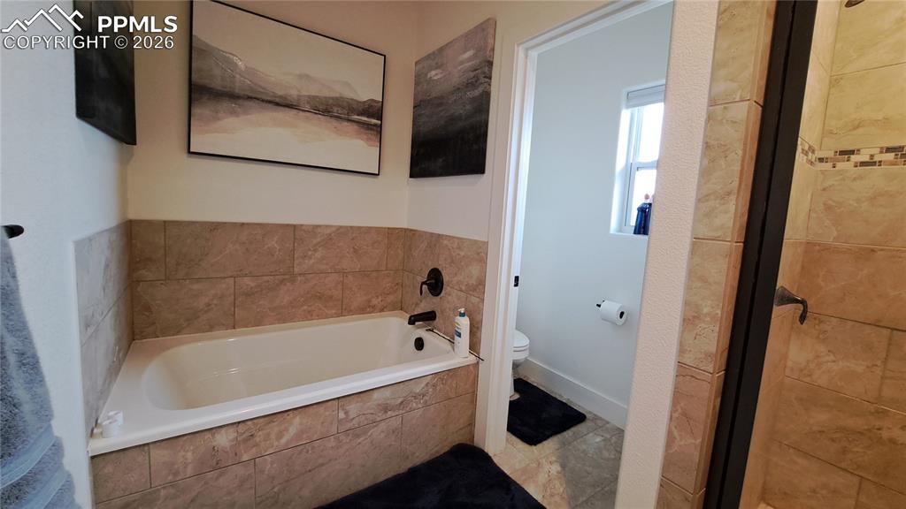 Image 21 of 40: Master Bathroom