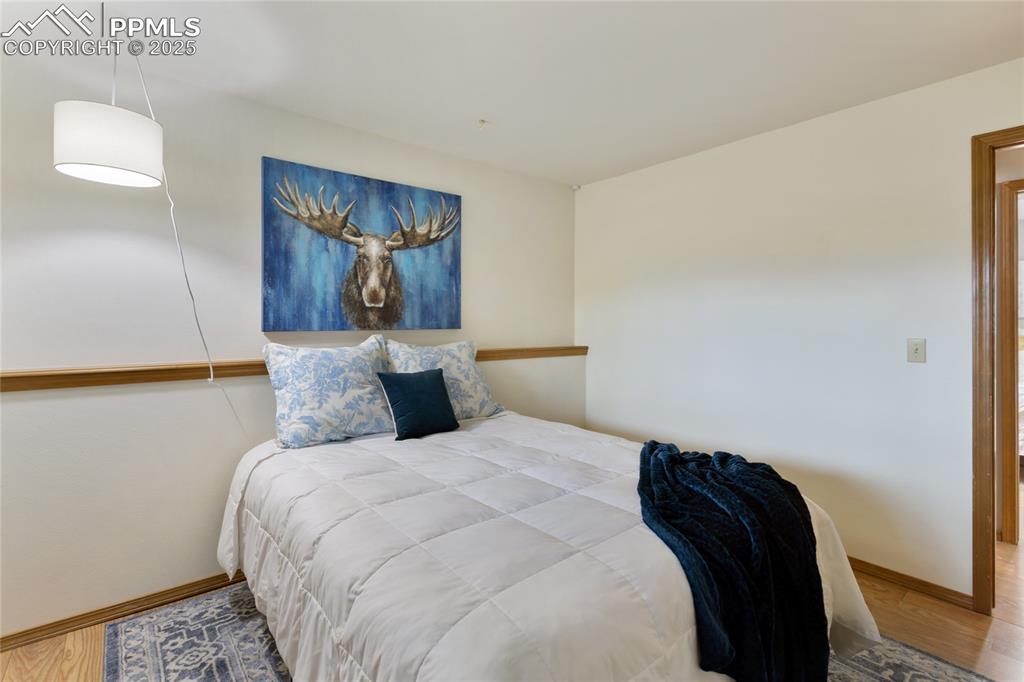 Image 31 of 44: Basement bedroom