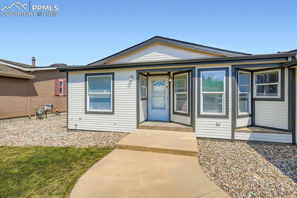 Image 3 of 28: View of front of home