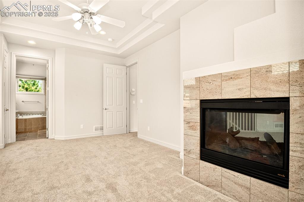 Image 10 of 35: Master Bedroom with fireplace and attached 5 piece bathroom