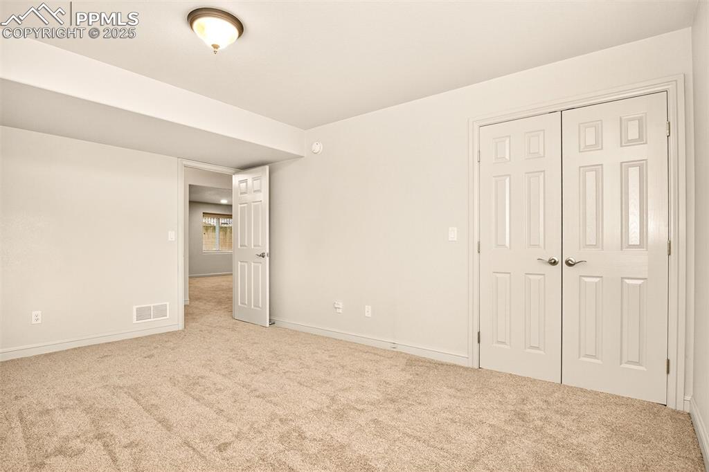 Image 29 of 35: Unfurnished bedroom featuring carpet flooring and a closet