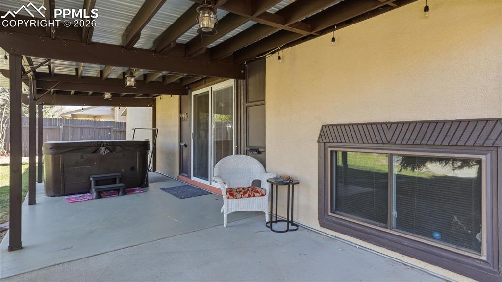 Image 11 of 50: Main level Sunroom.