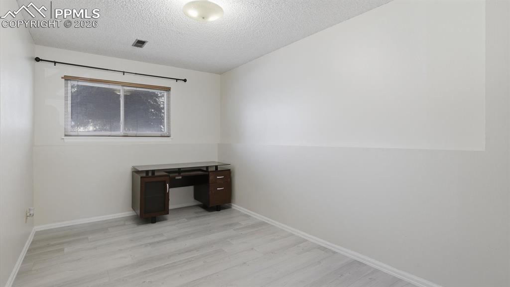 Image 37 of 50: Serve your favorite beverages and snacks from the lower level wet bar.