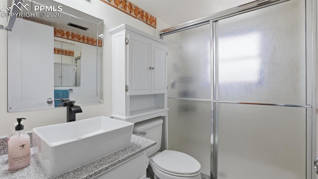 Image 41 of 50: Lower Level Bedroom #3 with LVP flooring.