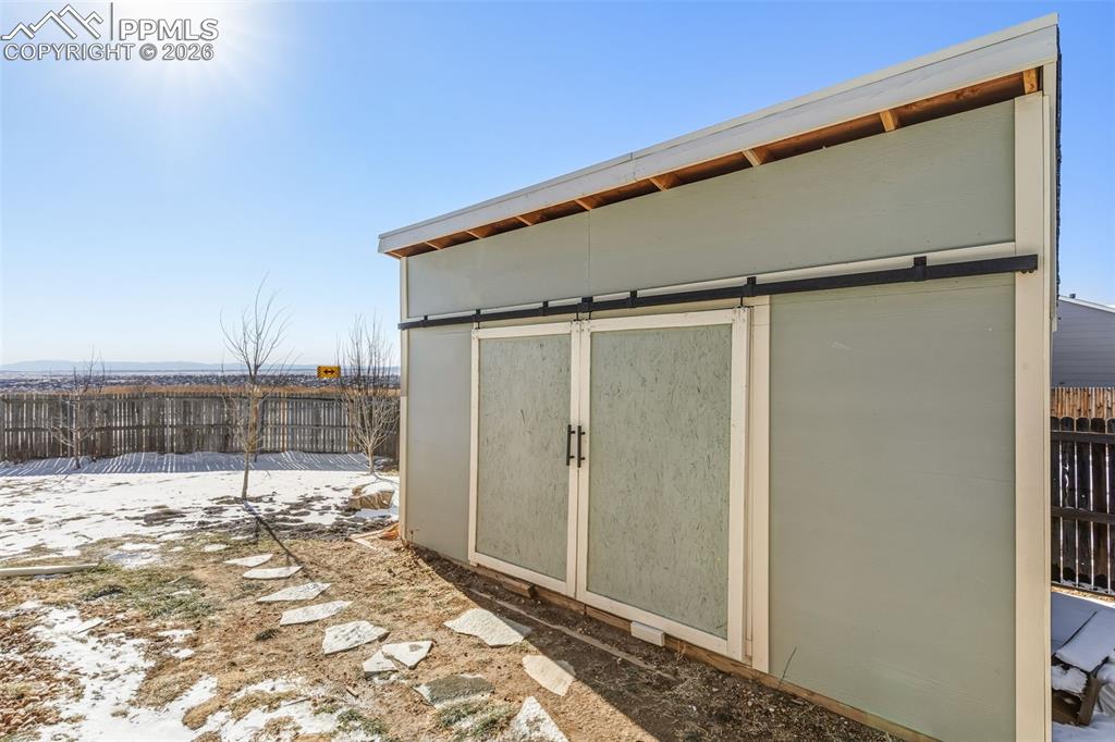 Image 39 of 50: New storage shed