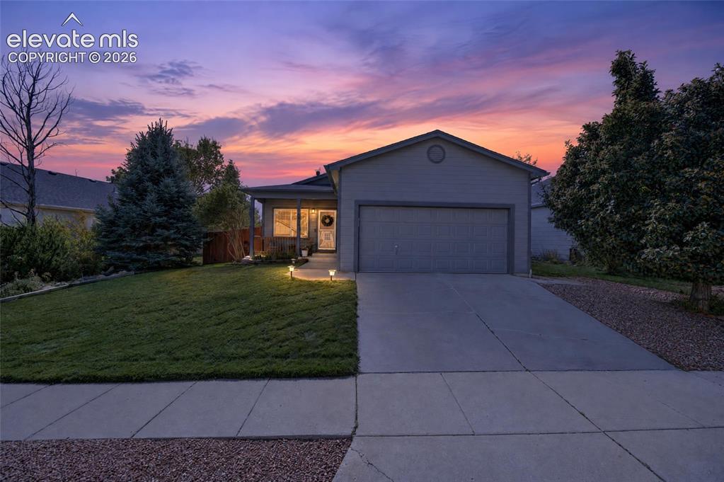 Image 2 of 31: Front exterior at twilight