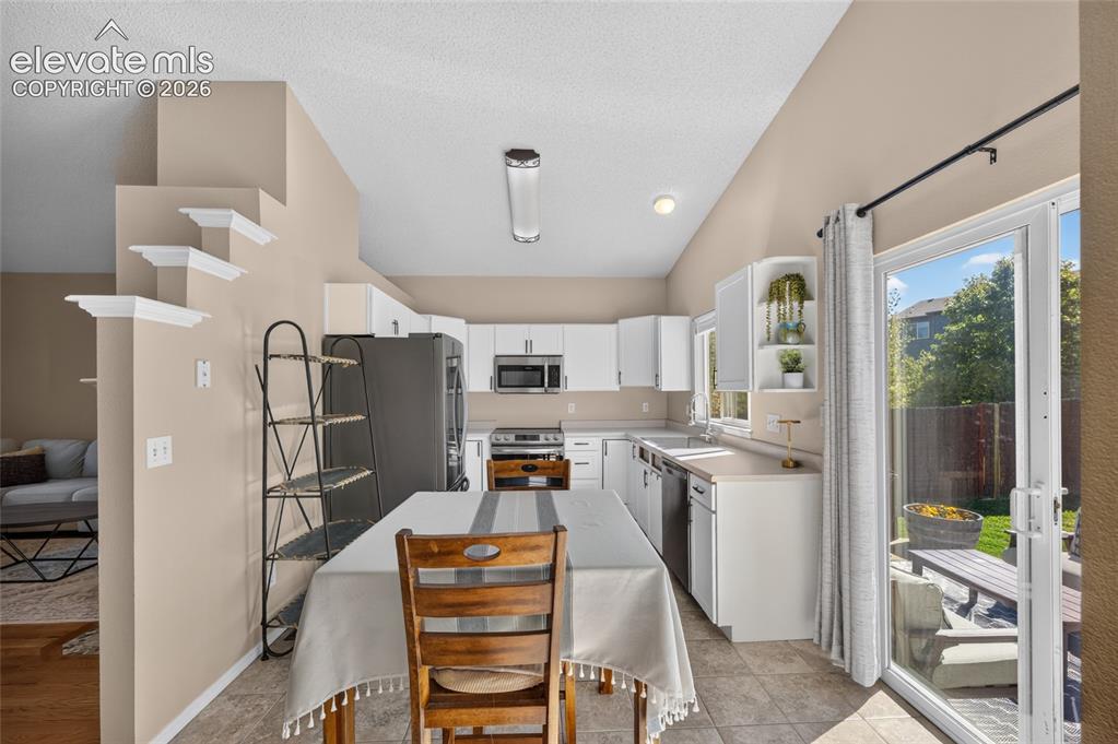 Image 8 of 31: Refreshed kitchen with stainless appliances (2022) and updated cabinet fron