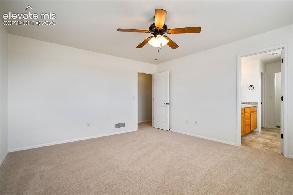 Image 20 of 39: Versatile bedroom space. 