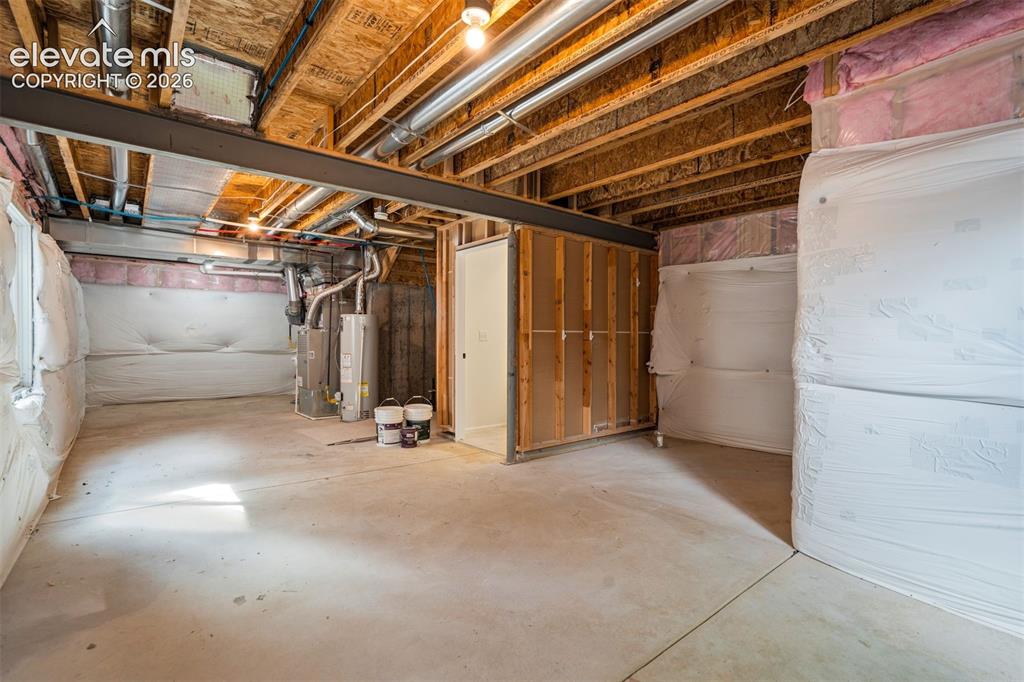 Image 37 of 39: Unfinished basement for whatever you need it for.