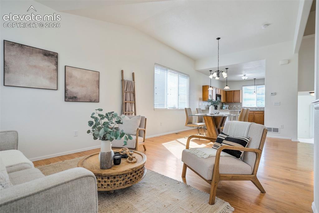 Image 4 of 39: Real Oakwood flooring throughout the main level.