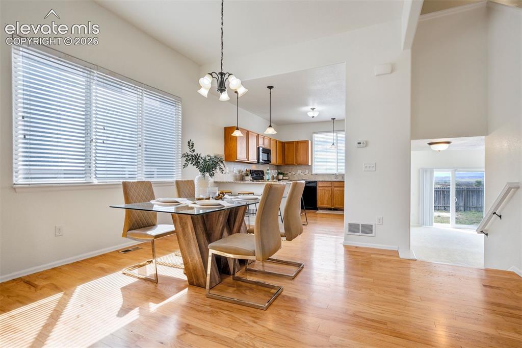 Image 8 of 39: Convenient dining space with room to gather with all the family members. 