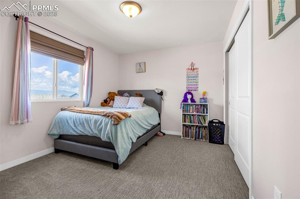 Image 18 of 38: Bedroom