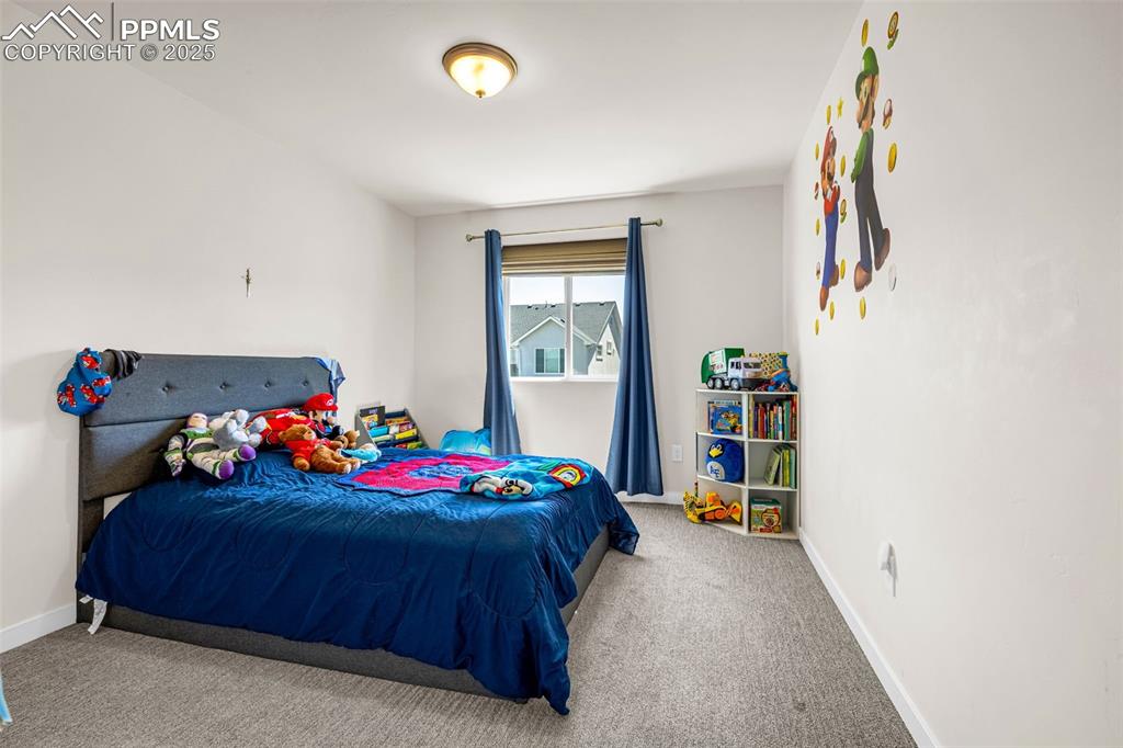 Image 19 of 38: Bedroom