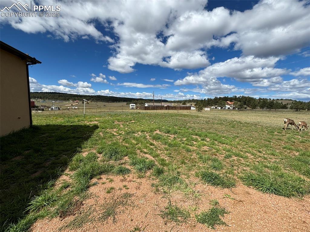 Image 25 of 29: View of yard with a rural view
