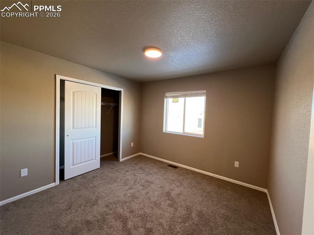 Image 25 of 32: Bedroom