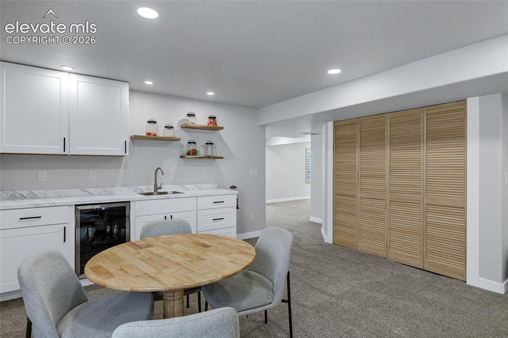 Image 33 of 45: Wet bar in Basement