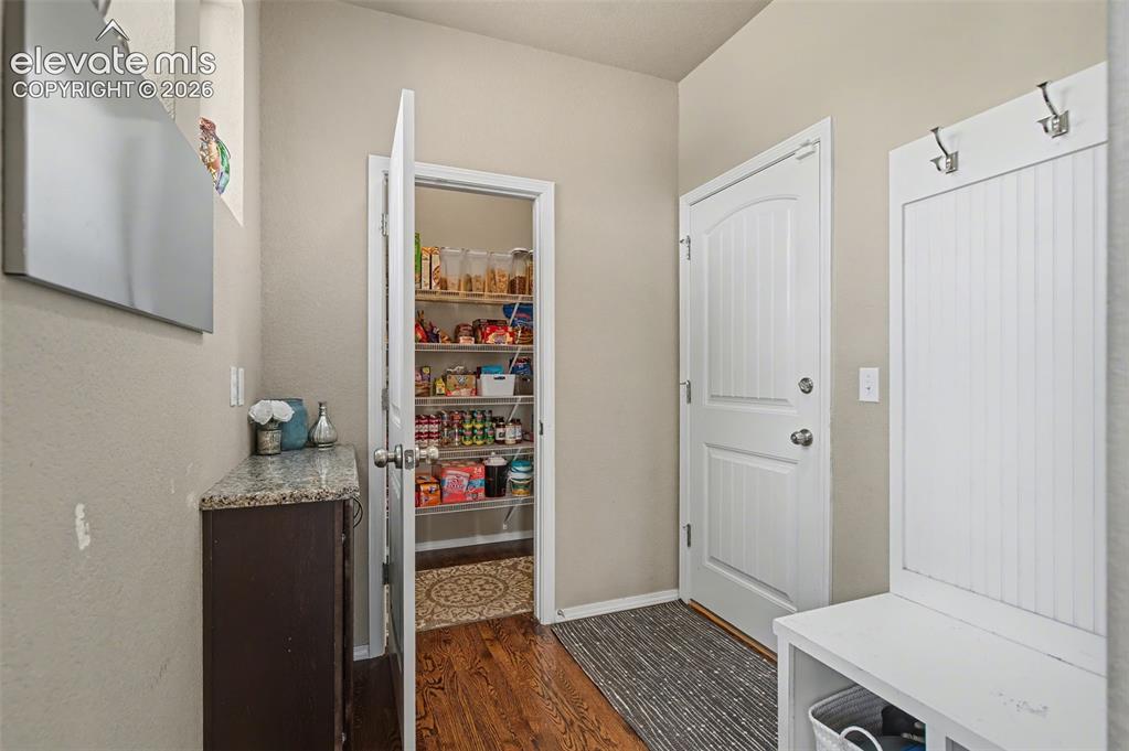 Image 16 of 40: Pantry and mud room