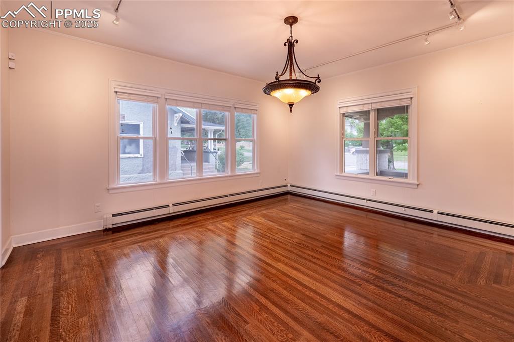 Image 11 of 49: Dining with Bob Mackie light fixture