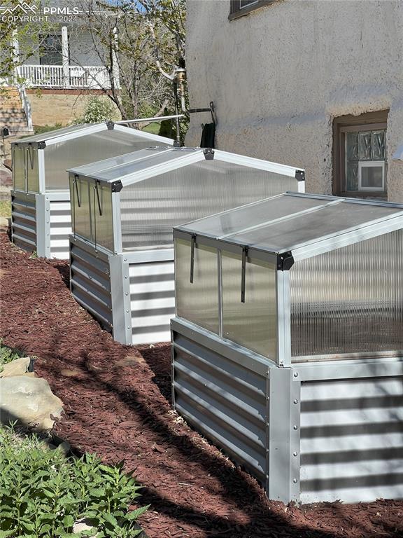 Image 39 of 49: Includes 3 mini greenhouses.