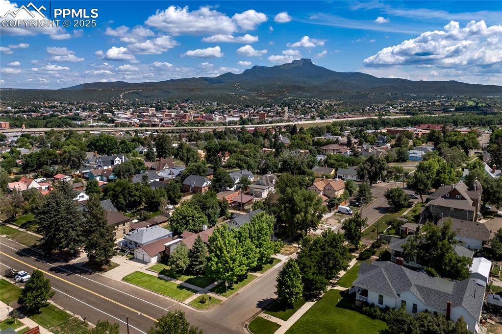 Image 43 of 49: Aerial perspective of neighborhood area and Fishers Peak where the 19,000 a