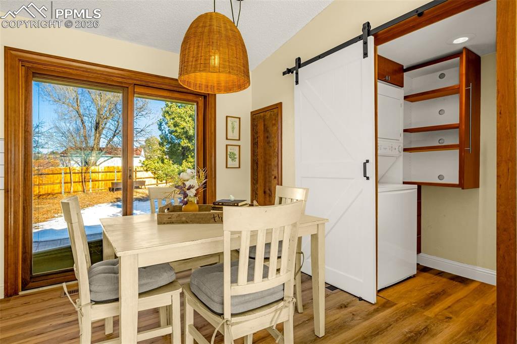 Image 4 of 20: Kitchen, Laundry, and Back entry view