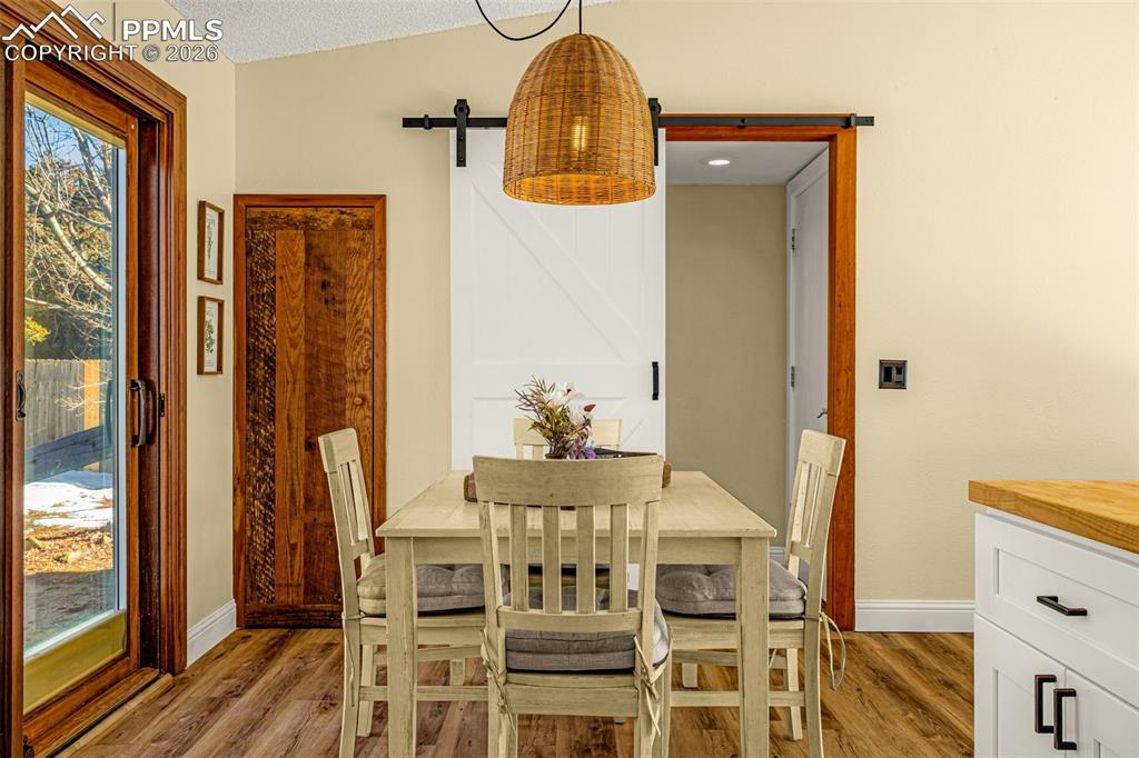 Image 5 of 20: Kitchen to dining, pantry, and laundry view