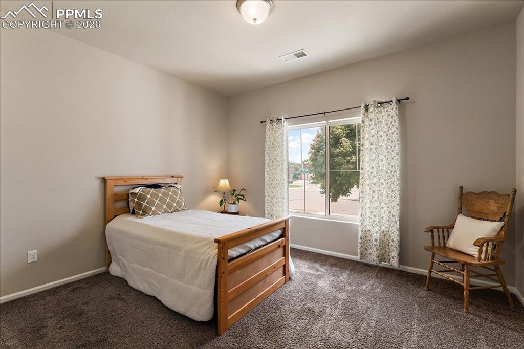 Image 14 of 28: Main Floor Bedroom