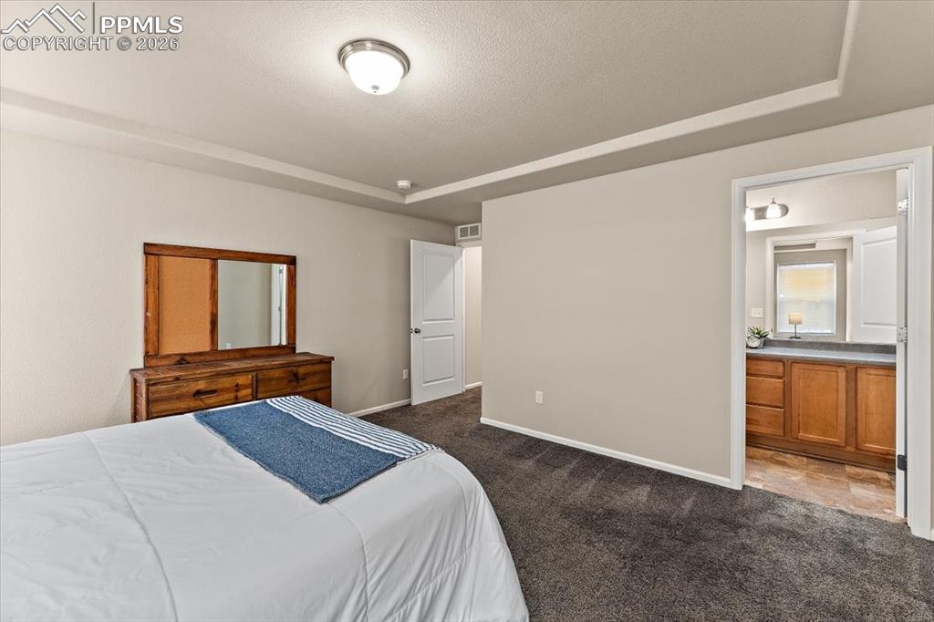 Image 18 of 28: Upstairs Bedroom w/ on-suite