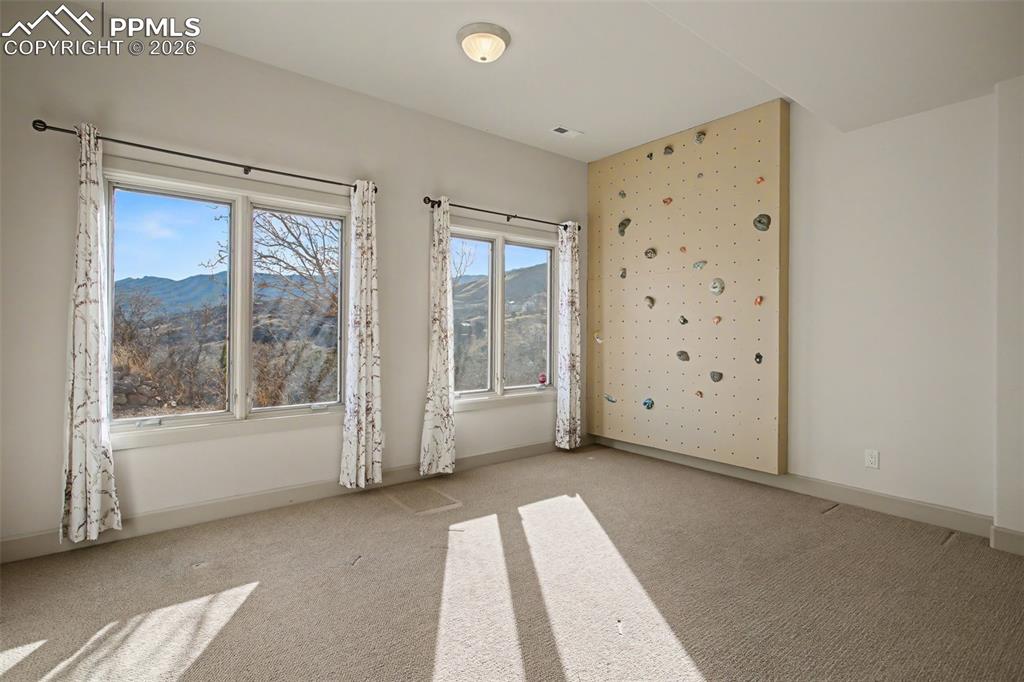 Image 22 of 44: Basement bedroom number 1.