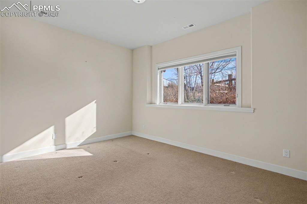 Image 28 of 44: Basement bedroom number 3.