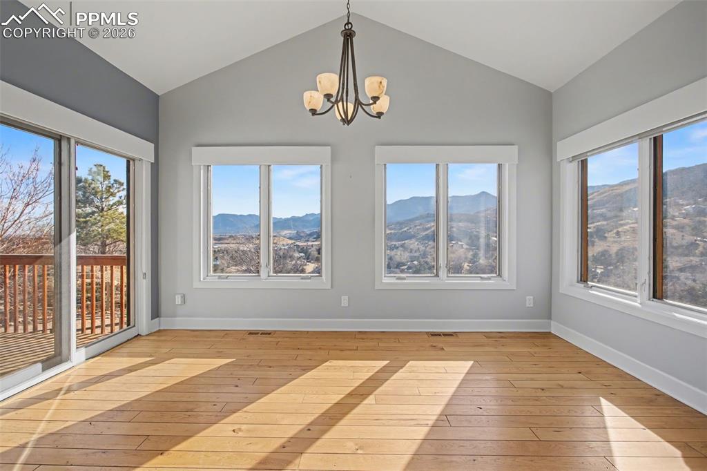 Image 8 of 44: Dining area with walkout to deck.